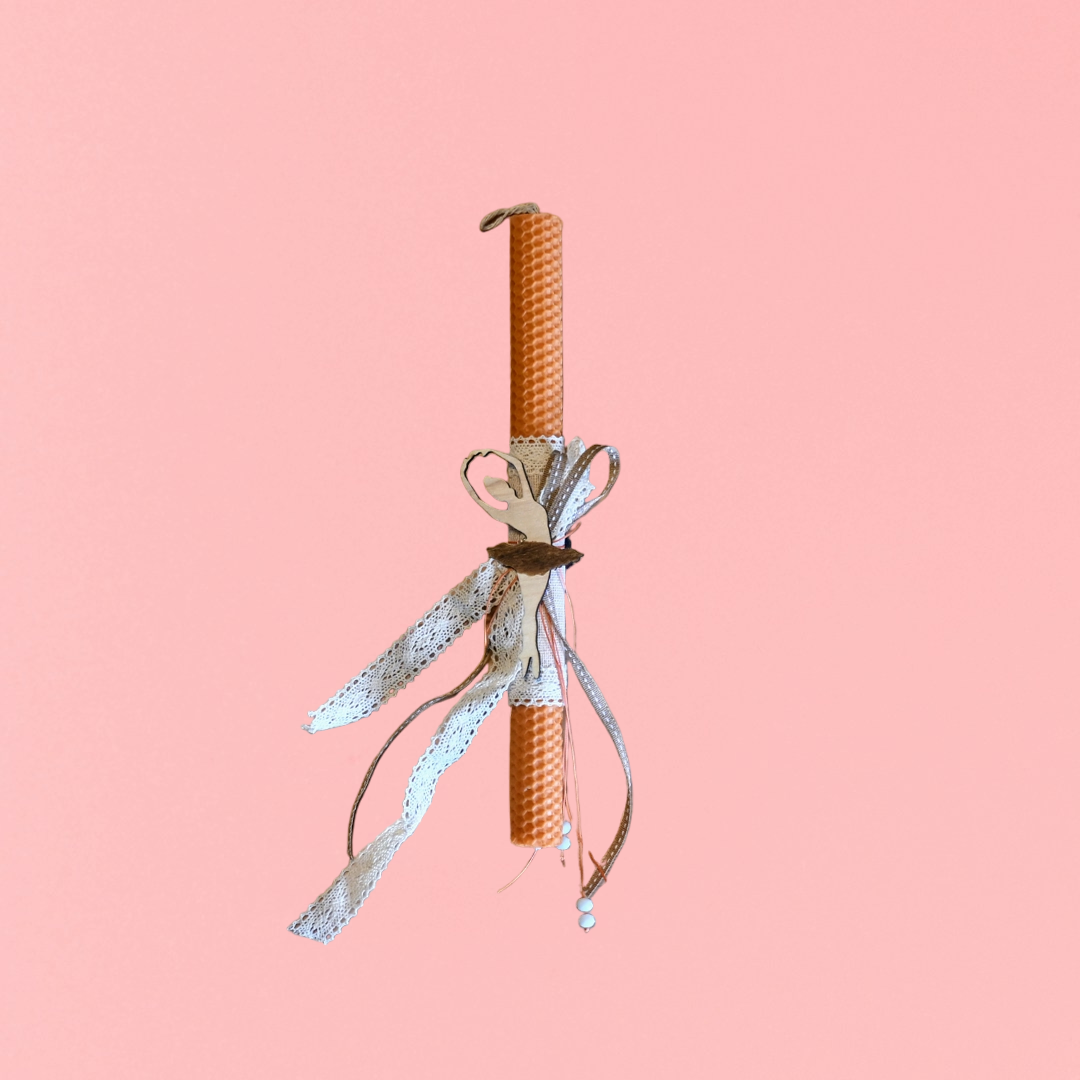 Easter colored candle with wooden ballerina decoration