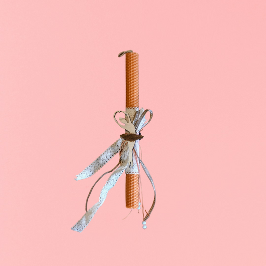 Easter colored candle with wooden ballerina decoration