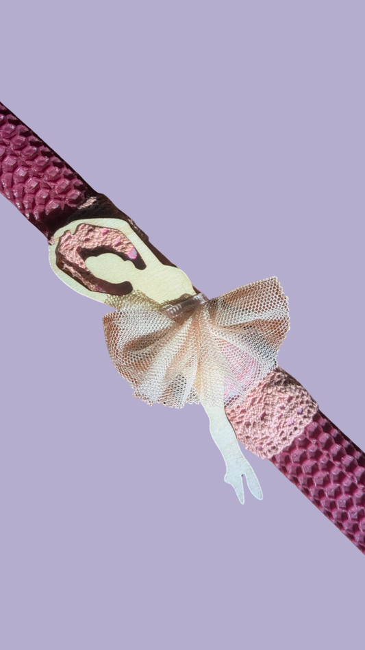 Easter colored candle with wooden ballerina decoration