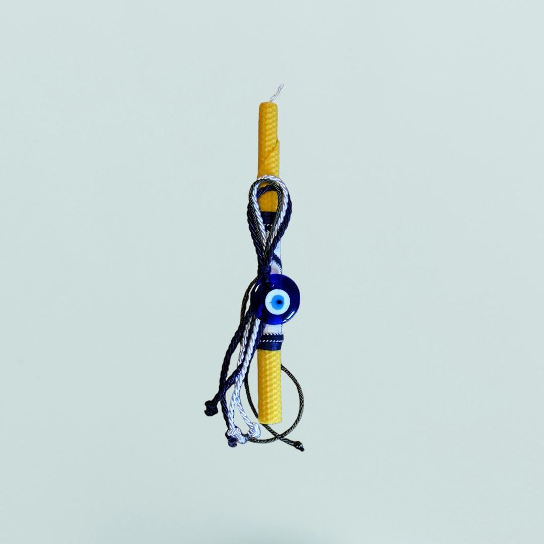 Osterkerze mit Glücksauge-Amulett