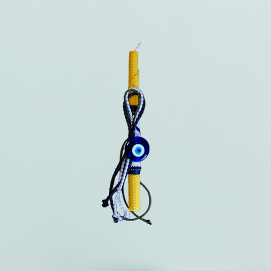 Easter candle with a lucky eye amulet