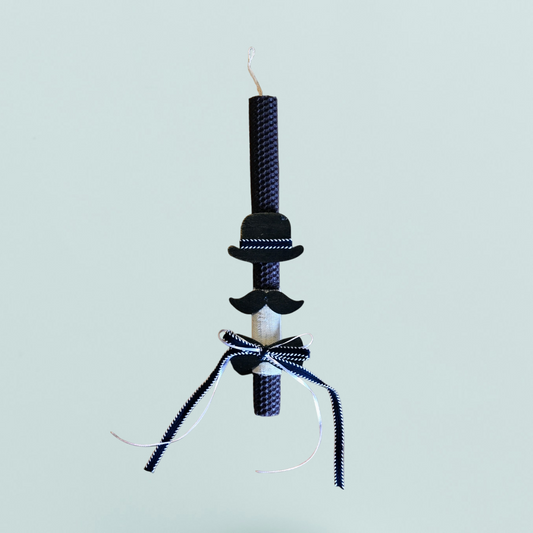 Easter colored candle with wooden decorations Mr. Moustache