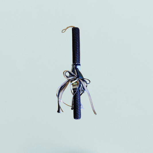 Easter colored candle with metal boat