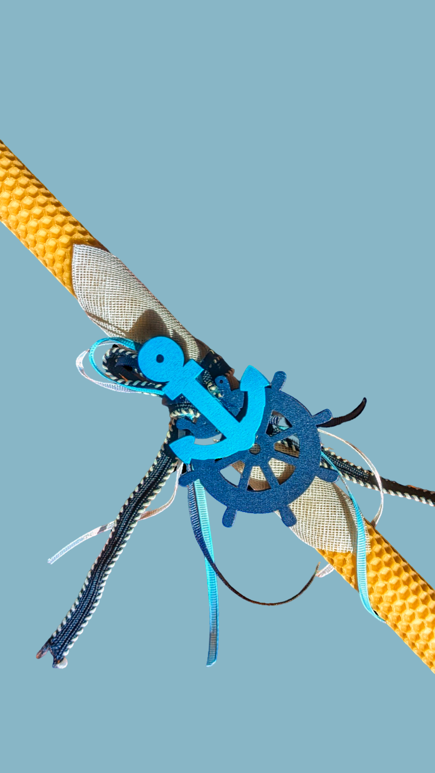 Easter candle with wooden nautical decorations