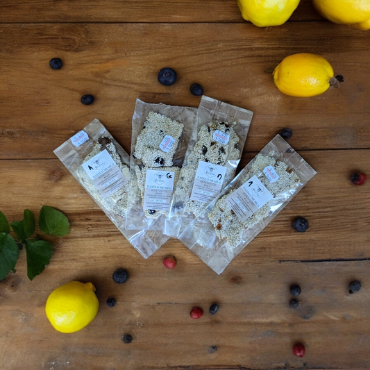 Handmade pasteli with honey, sesame, citrus fruits and nuts