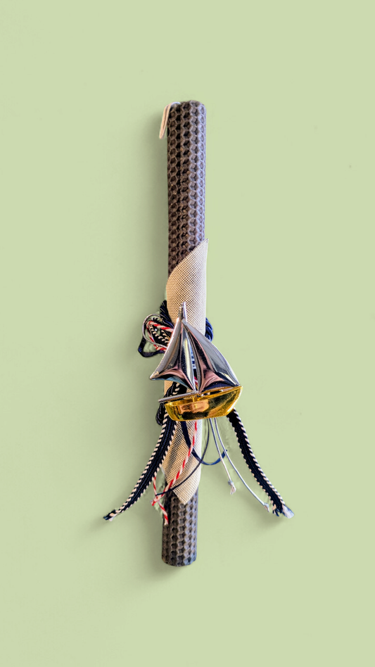 Easter colored candle with metal boat
